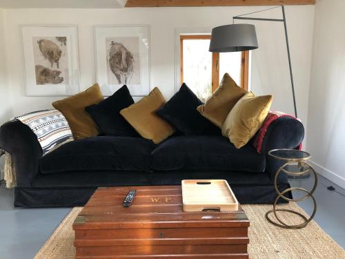 Zona de estar de Raven Cottage