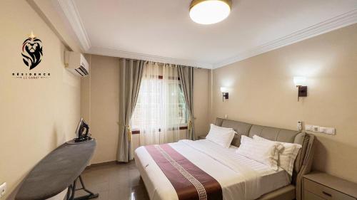 Postel nebo postele na pokoji v ubytování Résidence le CARAT batiment GOLF