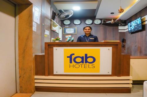 a woman standing behind a podium behind a lectern at FabExpress Diamond - Nr BKC in Mumbai
