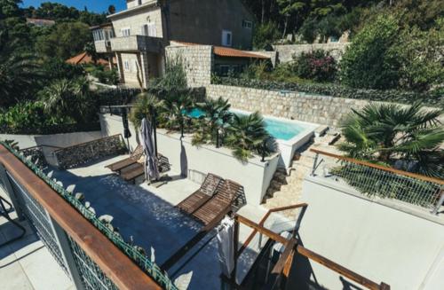 an image of a swimming pool on a house at Palm Tree Apartments in Dubrovnik