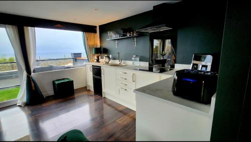 Η κουζίνα ή μικρή κουζίνα στο Carberry Lodge