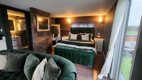 Ένα ή περισσότερα κρεβάτια σε δωμάτιο στο Carberry Lodge