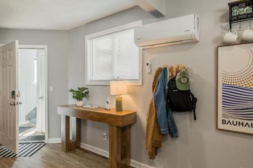 a room with a desk and a window at Home in Kansas City 15 mins to KCI with a KING bed and workspace in Riverside