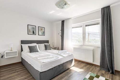 Postel nebo postele na pokoji v ubytování Villa Green Paradise