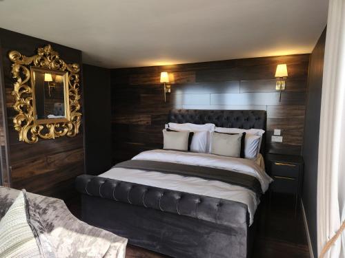 Ένα ή περισσότερα κρεβάτια σε δωμάτιο στο Fa'side Lodge