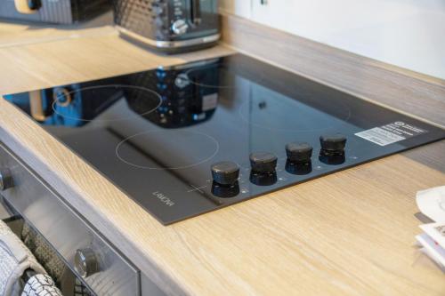 Køkken eller tekøkken på NEW! 4BR in Stanley