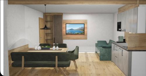 a kitchen and a living room with a table and chairs at die Harmonie in Nauders