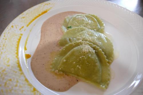 a plate of food with desert on a table at Hotel L'Ulivo in Mirabella Eclano