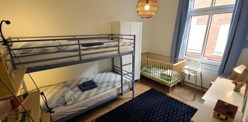 Postel nebo postele na pokoji v ubytování Hiddes Hus - Ferienwohnung Fuhrmann