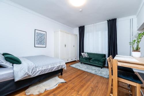 Ένα ή περισσότερα κρεβάτια σε δωμάτιο στο Design studio, all inclusive, 10 min to old town
