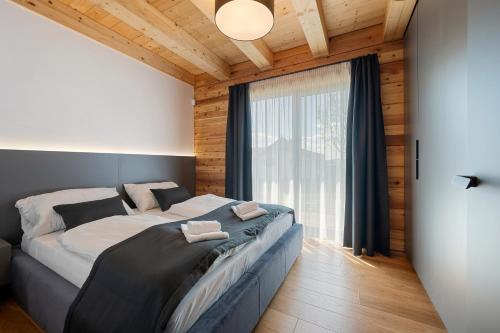 Postel nebo postele na pokoji v ubytování Roubenka Lipno