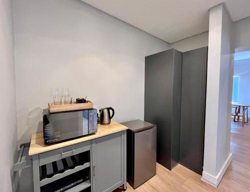 Kuchyň nebo kuchyňský kout v ubytování Blouberg Village Place