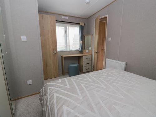 Ένα ή περισσότερα κρεβάτια σε δωμάτιο στο Ellies House