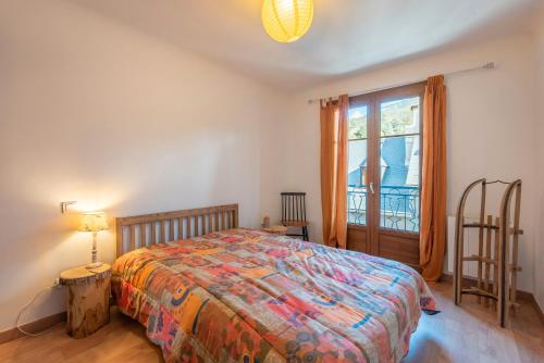 Una cama o camas en una habitación de Gite Au Coeur D'Arreau