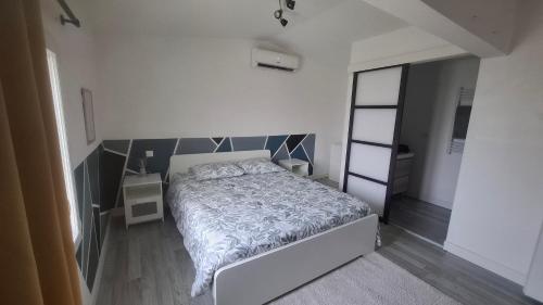 Ένα ή περισσότερα κρεβάτια σε δωμάτιο στο Ateka Dax
