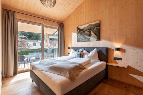 Postel nebo postele na pokoji v ubytování Schwaigermühle Apartments