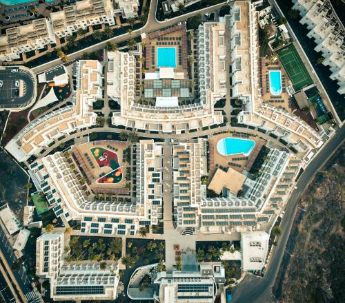 an overhead view of a city with buildings at Aequora Lanzarote Suites in Puerto del Carmen