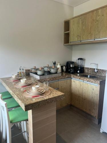 Η κουζίνα ή μικρή κουζίνα στο Residencial da Ju - Apto 02