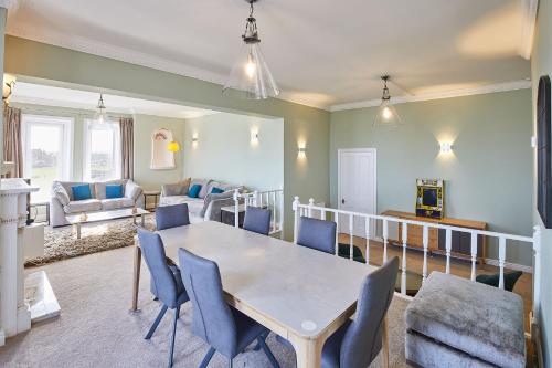 a dining room with a table and chairs at Host & Stay - Swift View in Whitby