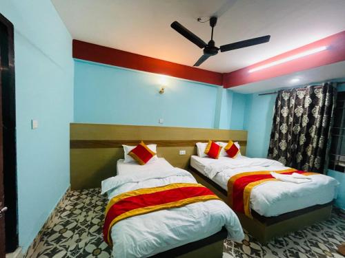 Postel nebo postele na pokoji v ubytování Hotel Devi Durga & Restaurant