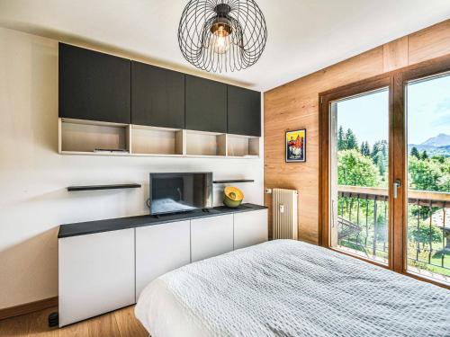 Charmant T2 + cabine, proche pistes et centre, balcon, cheminée, WIFI, parking, 4-5 pers.