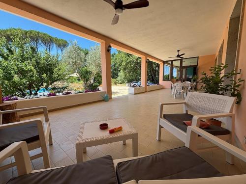a living room with a couch and a table at Villa with Garden near Rome for Groups & Families in Orte