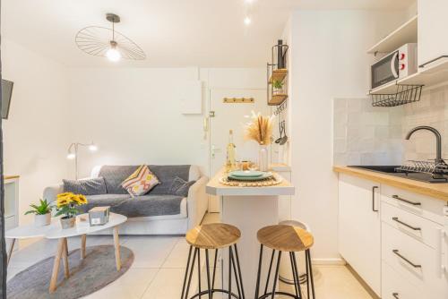 Η κουζίνα ή μικρή κουζίνα στο Pied dans l Eau Cosy Sablettes Clim WiFi