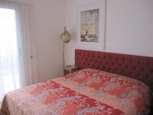 Ένα ή περισσότερα κρεβάτια σε δωμάτιο στο Villa Itati