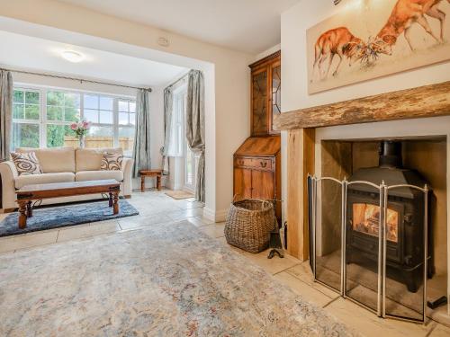 Posezení v ubytování Nurseries Cottage