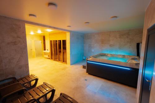 Ένα ή περισσότερα κρεβάτια σε δωμάτιο στο Quantara Resort Domaša