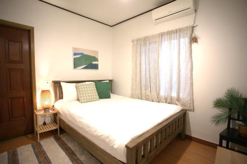 En eller flere senge i et værelse på Euphoria