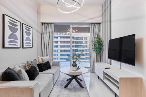 TV i/ili multimedijalni sistem u objektu Cityscape Comforts 2BR