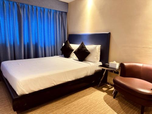 Ένα ή περισσότερα κρεβάτια σε δωμάτιο στο Studio Unit - Black Cat Studio - Santorini Hotel - Sta Lucia Mall Cainta Rizal