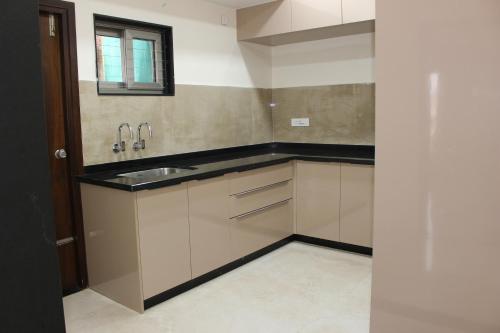 Η κουζίνα ή μικρή κουζίνα στο Black Buck Homestay