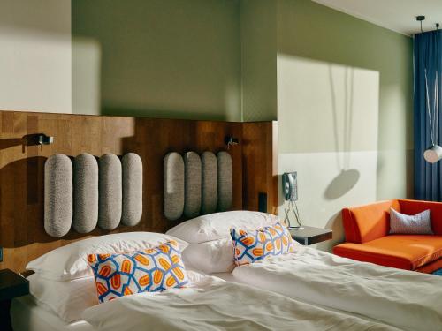 Postel nebo postele na pokoji v ubytování Hotel Ploberger