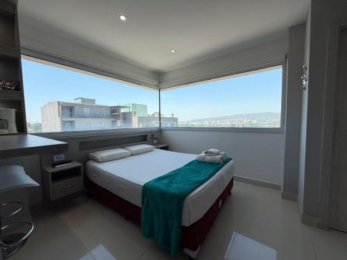 Ein Bett oder Betten in einem Zimmer der Unterkunft Suite La Posta