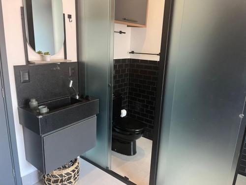 Ванная комната в Flat Mar Doce Lar na praia do Bessa