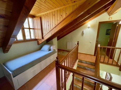 En eller flere senge i et værelse på Dúplex a 20 min de Aigüestortes