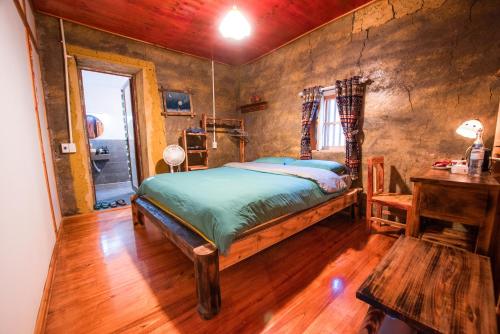Postel nebo postele na pokoji v ubytování Gõ Kiến Homestay