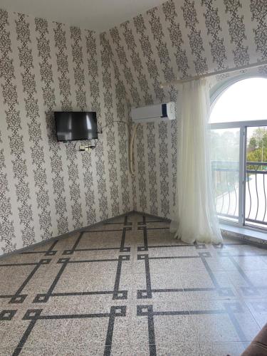 TV a/nebo společenská místnost v ubytování Bulvar