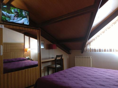 Postel nebo postele na pokoji v ubytování Hotel Apartamentos Don Juan I
