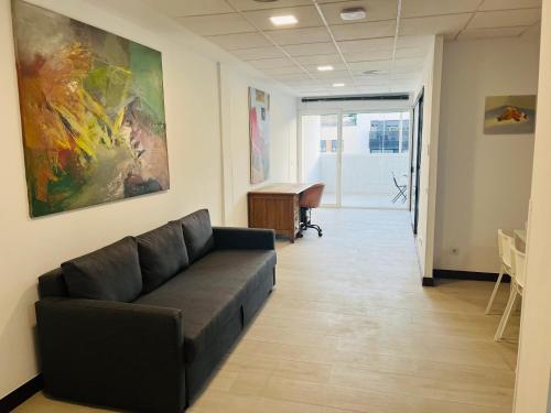 Ruang duduk di LUMINOSOS APARTAMENTOS POZUELO a 8 MINUTOS DE PALACIO REAL