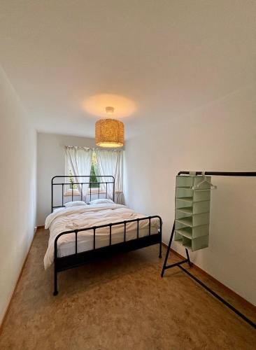 Postel nebo postele na pokoji v ubytování Simple and Cozy Flat in Zurich