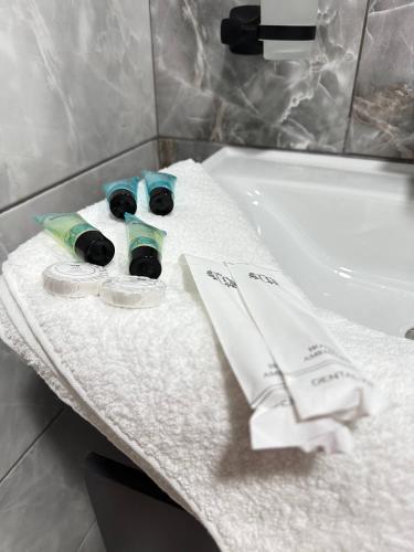 Koupelna v ubytování Olive Dream Apartment with Balcony View