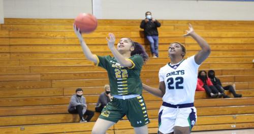 two girls are playing a game of basketball at Trinidad near port of spain in Port-of-Spain