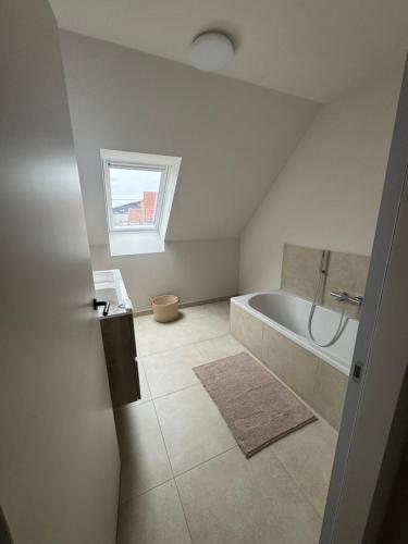 Giường trong phòng chung tại Maison frère