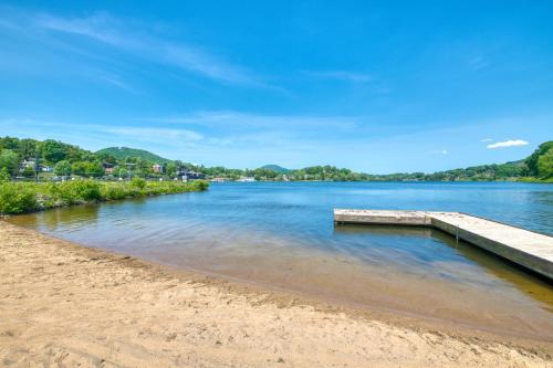 a dock on the shore of a body of water at Morris Villa Lower in Lake Junaluska