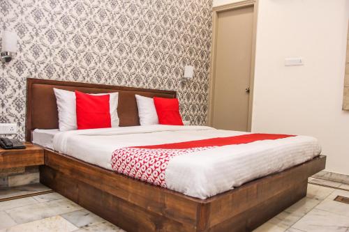 Ένα ή περισσότερα κρεβάτια σε δωμάτιο στο Collection O Chawla