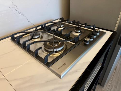 a stove top oven sitting on top of a counter at Villas Na-tiva Guanacaste in Plazuela