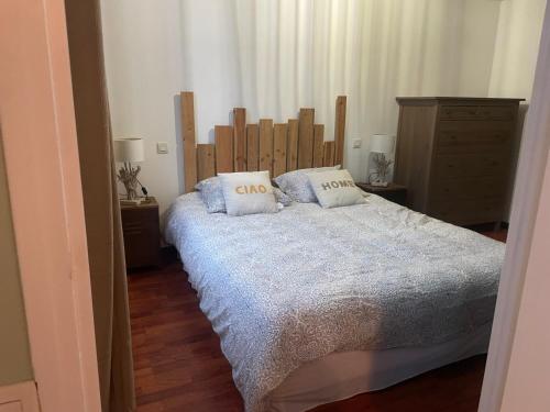 Ένα ή περισσότερα κρεβάτια σε δωμάτιο στο Appartement champenois